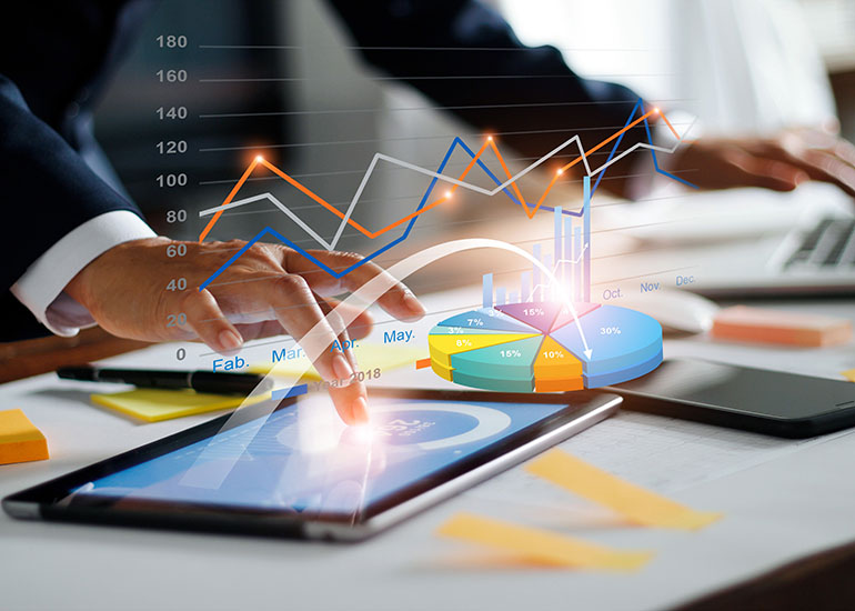 Business hands using ipad with data - feature