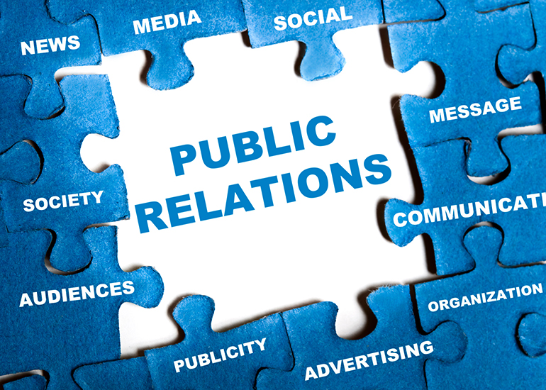 Blue and white puzzle with 'public relations' highlighted in the centre