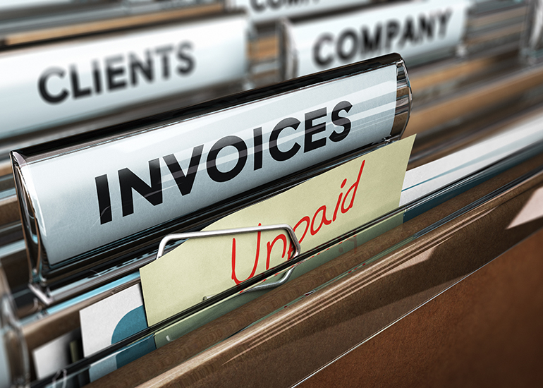 Invoices in filing cabinet