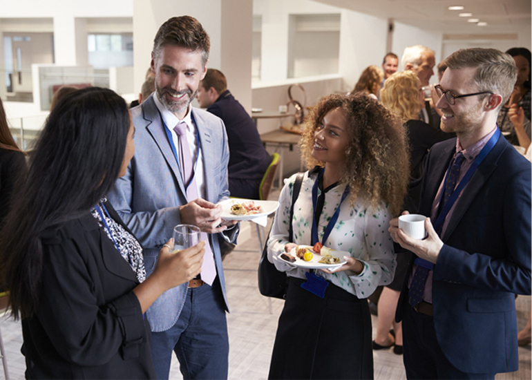Group of entrepreneurs and business people at networking event