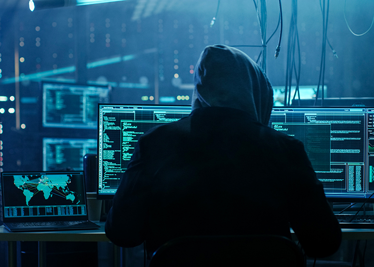hacker at computers