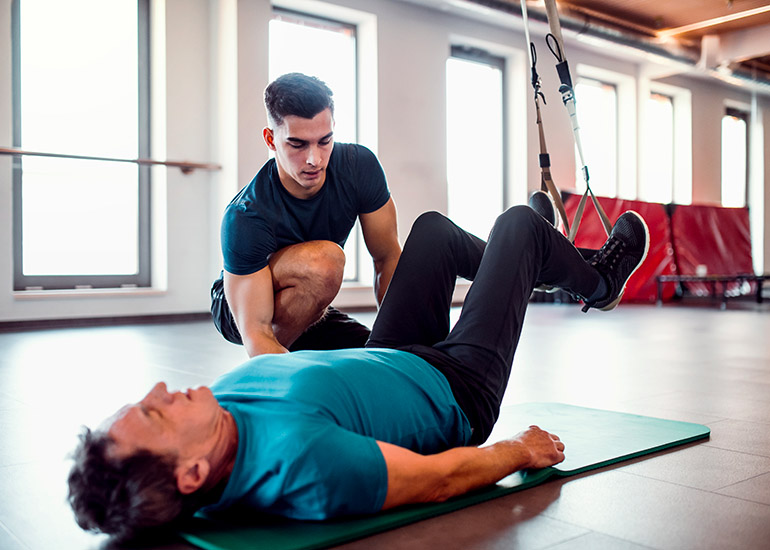 personal trainer in gym