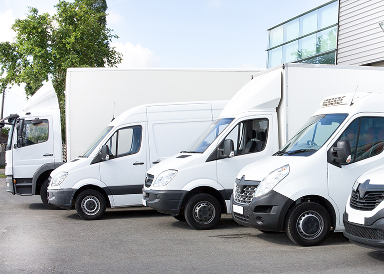 fleet of delivery vehicles vans