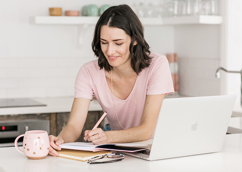Emma Kate works on a design