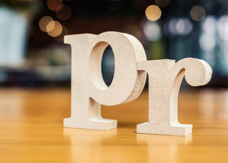 Wooden block letters: P and R