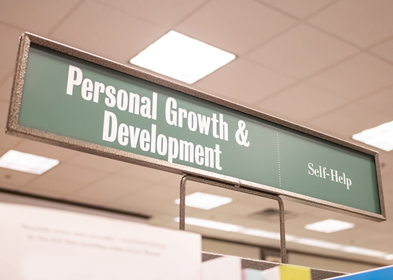 Library section sign: Personal development and self-help