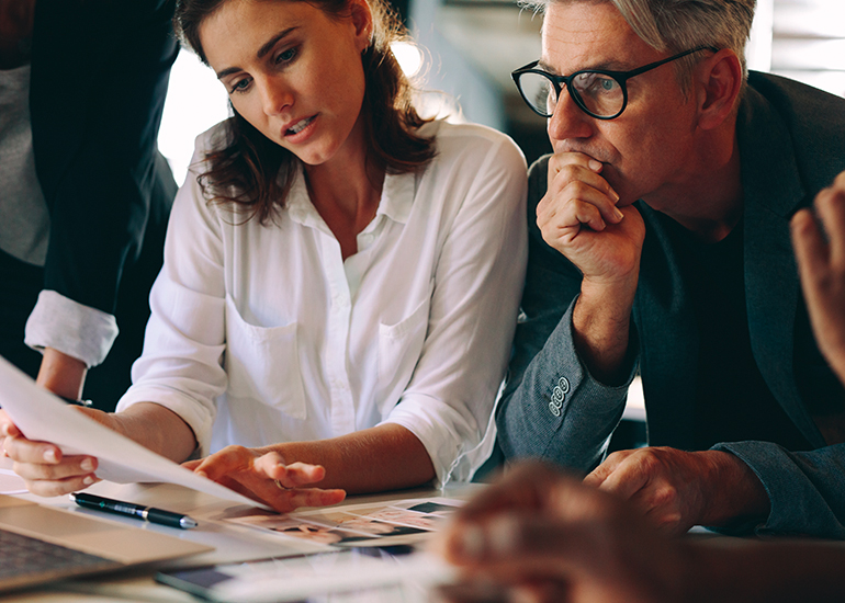 Business meeting with woman and man looking stressed