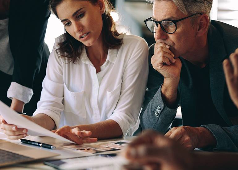 Business meeting with woman and man looking stressed