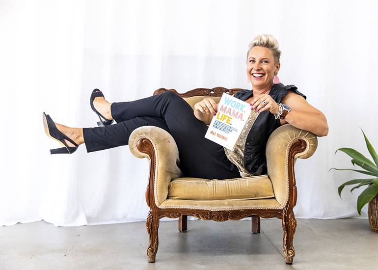 Dr Ali Young with 'Work Mama Life' book