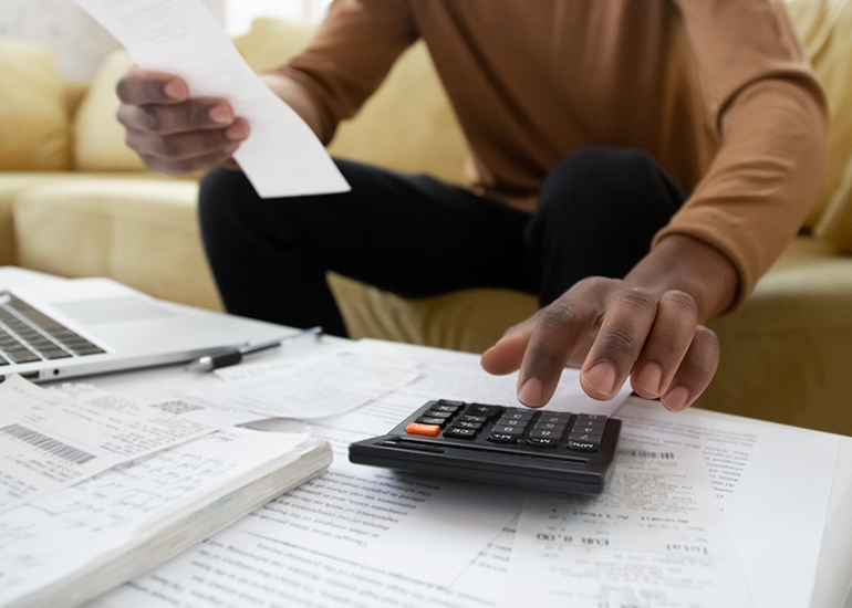 Using calculator to file receipts for tax