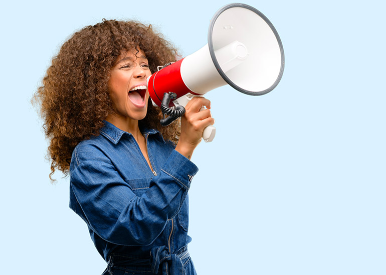 woman using megaphone loudspeaker
