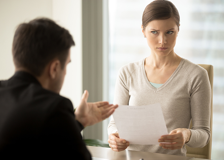 man trying to convince distrustful woman