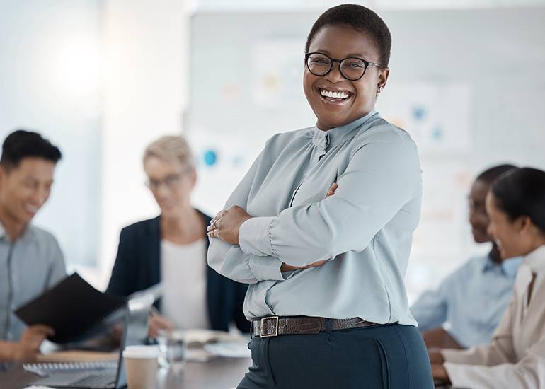 happy confident business woman in office
