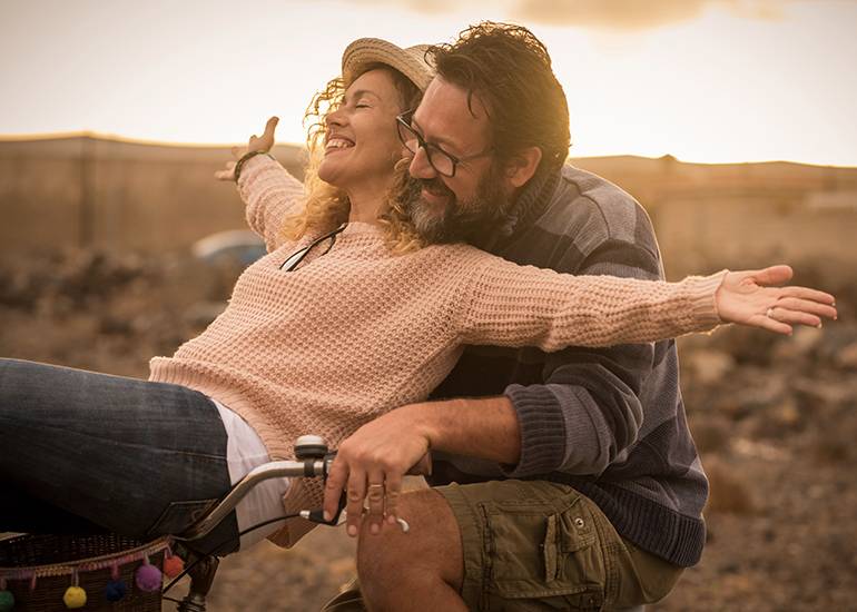 happy couple bike ride