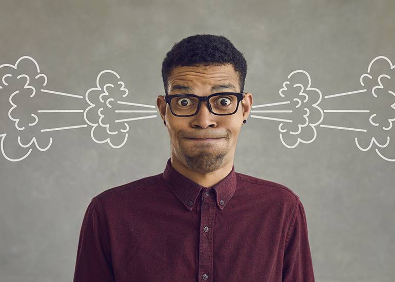 annoyed man with steam coming out ears