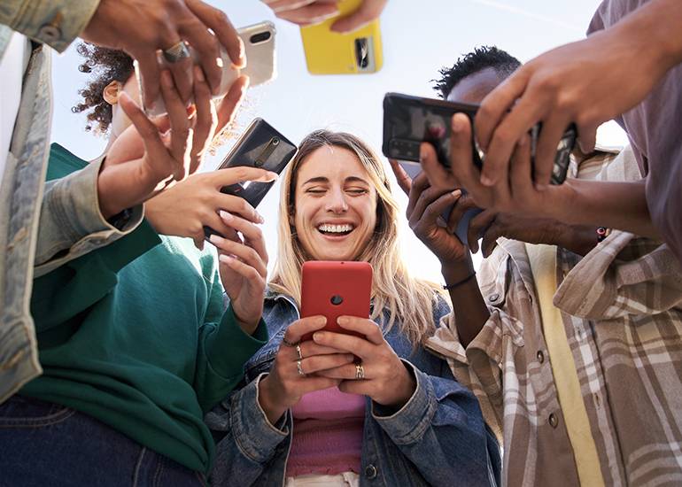 A group of young people on phones