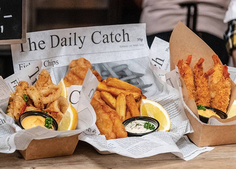 takeaway fish and chips in newspaper
