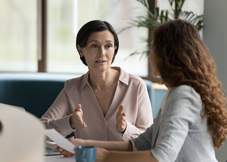 two women having a meeting or difficult work conversation