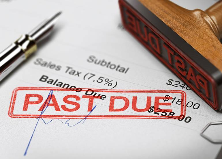 late payment times are an issue for small business. Bill shows stamp that reads past due
