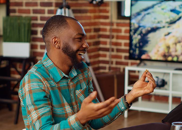 happy man gesturing as he tells a story.