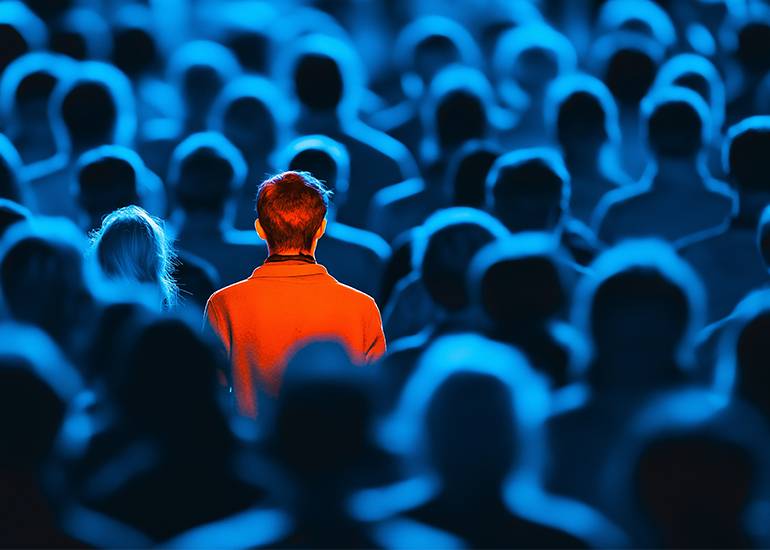 unique - person in red in a sea of blue
