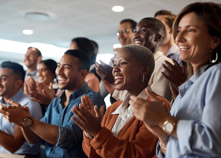 audience clapping an awards winner
