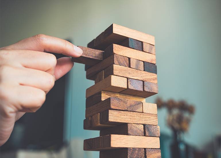Jenga game taking a risk